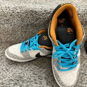 Nike SB White and Black Sneakers with Blue Laces